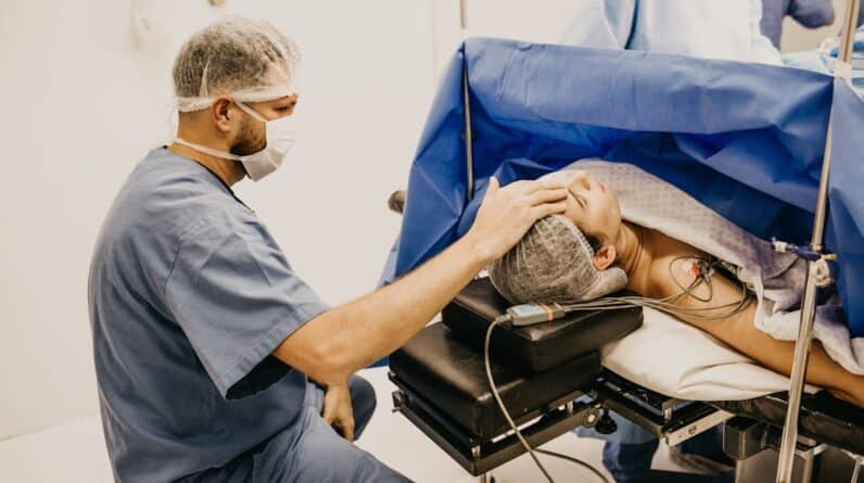 Photo Dentists treating sensitive teeth